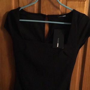 Little black dress with tags.